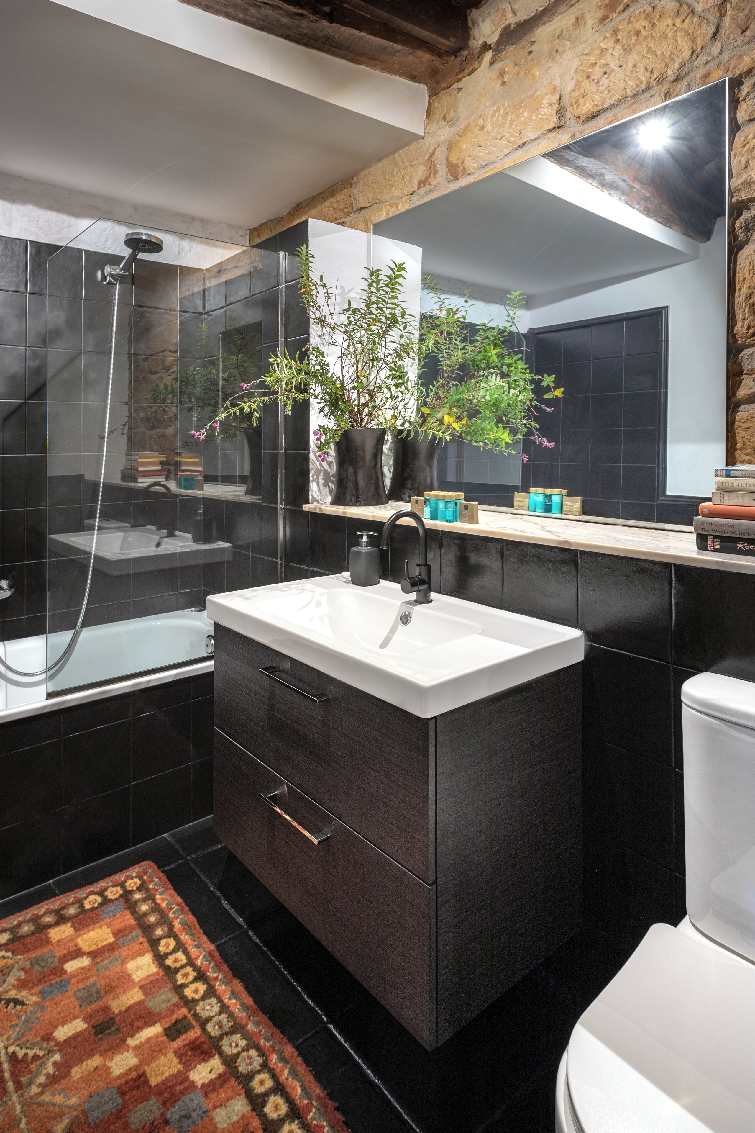 Bathtub, hair dryer, towels, soap