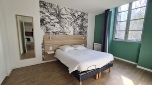Apartament familiar | Roba de llit d'alta qualitat i espai de treball apte per a portàtils 