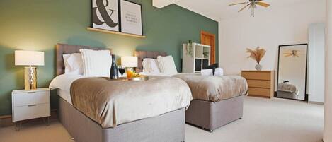 4 bedrooms, desk, iron/ironing board, travel crib