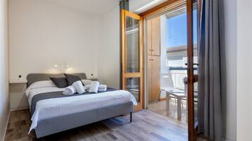 2 dormitorios, tabla de planchar con plancha, wifi gratis y ropa de cama