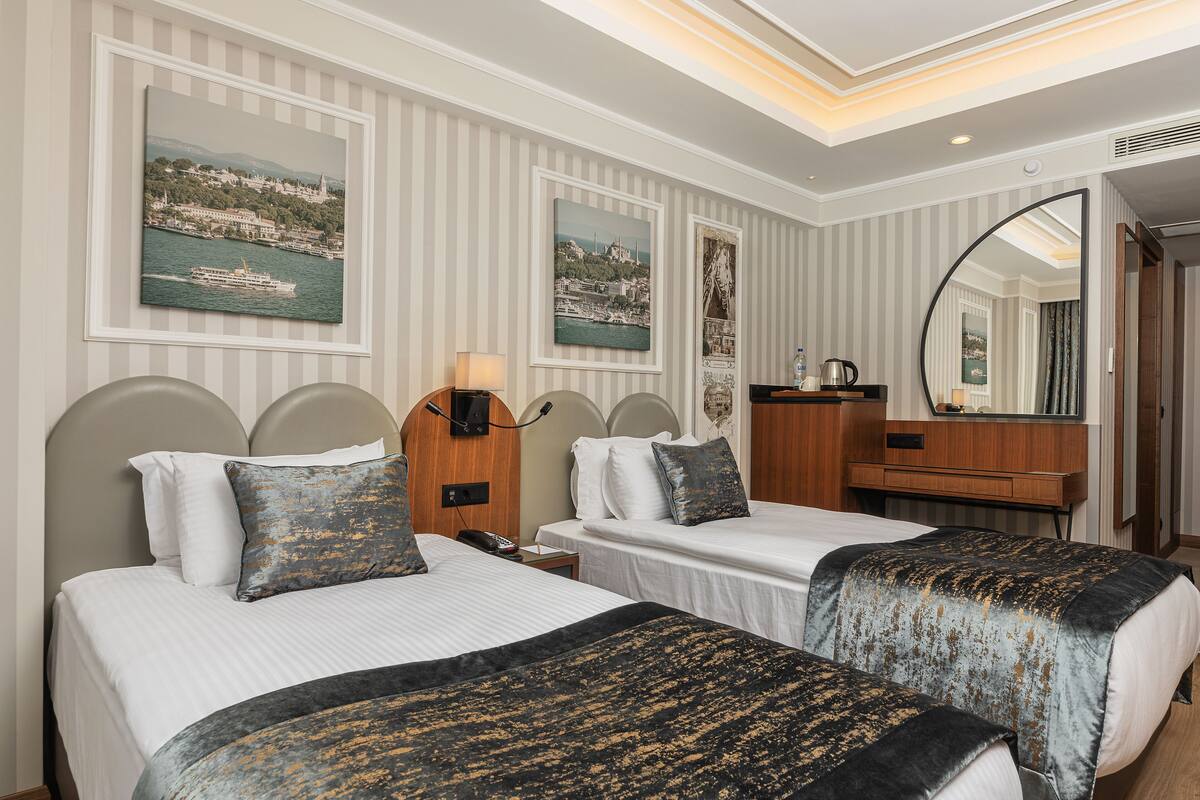 Standard Twin Room | ميني بار ومكتب ومساحة عمل للكمبيوتر المحمول وتجهيزات عازلة للصوت