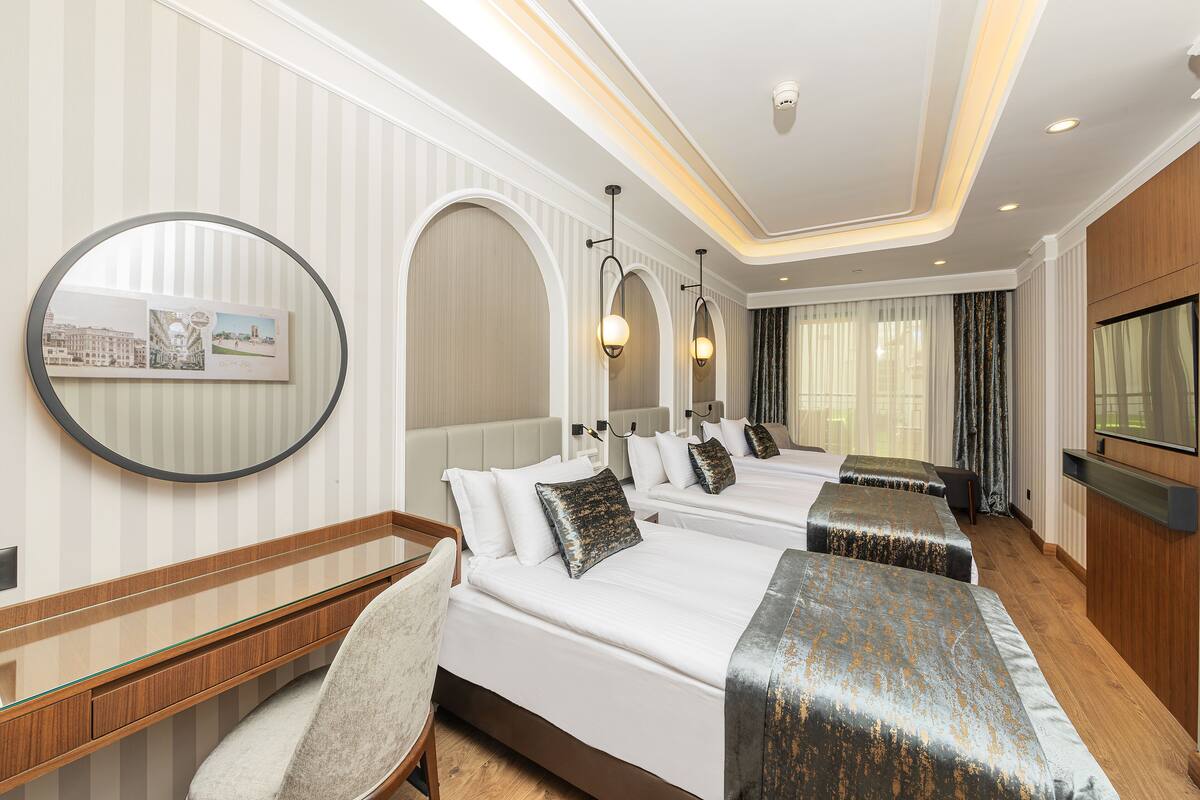 Standard Triple Room | ميني بار ومكتب ومساحة عمل للكمبيوتر المحمول وتجهيزات عازلة للصوت