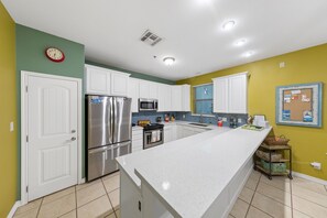 Fridge, microwave, oven, stovetop - Come Relax at Casa de Colores Condo by the BEACH (South Padre Island)