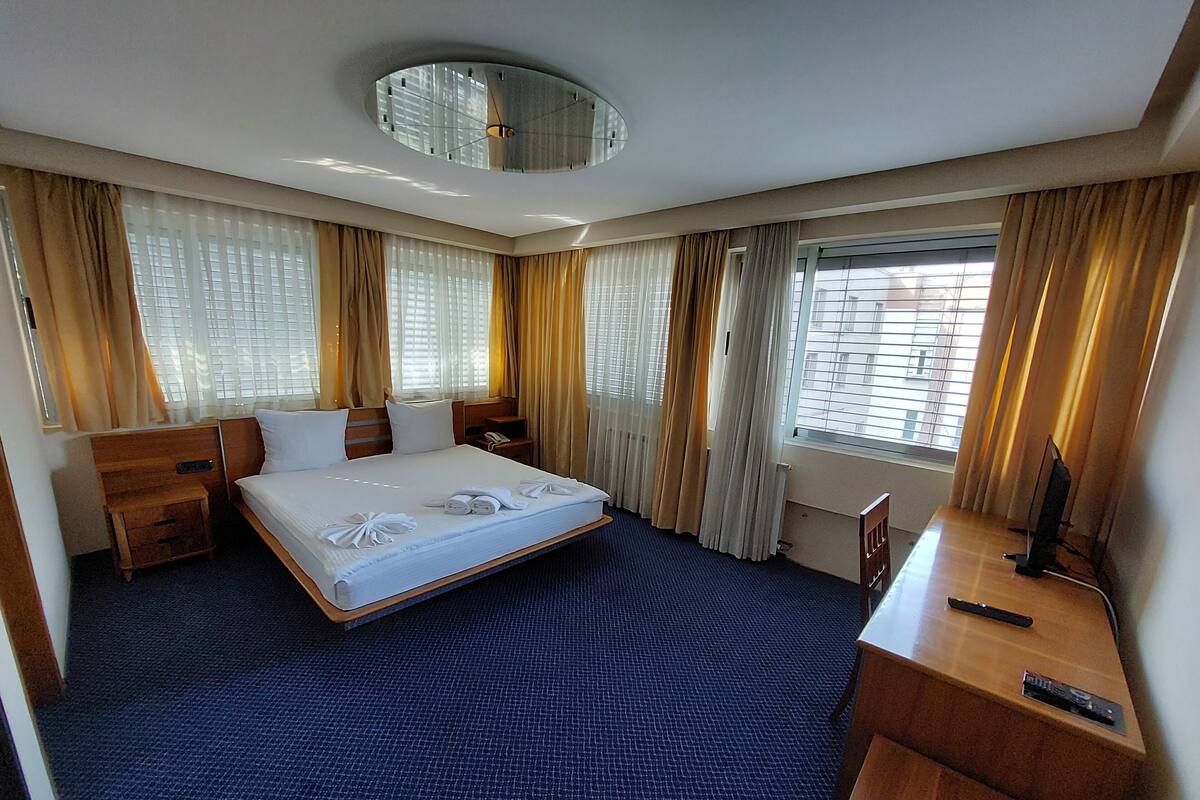 Blackout curtains, iron/ironing board, free WiFi, bed sheets