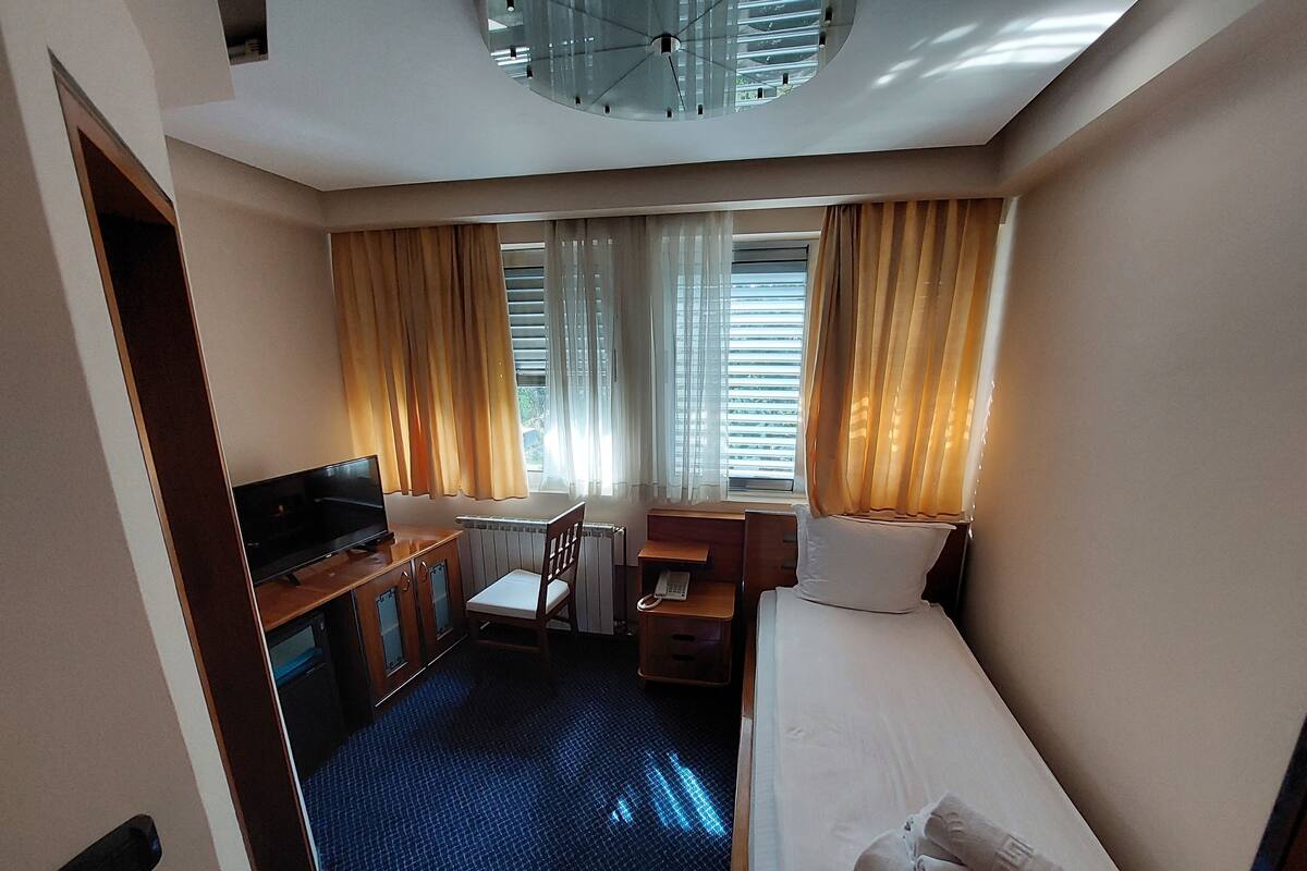 Blackout curtains, iron/ironing board, free WiFi, bed sheets