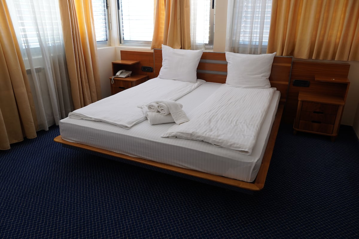 Blackout curtains, iron/ironing board, free WiFi, bed sheets