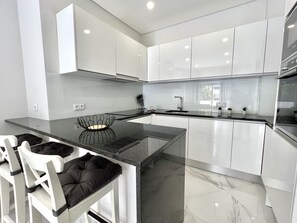 Fridge, microwave, oven, dishwasher