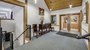 A staircase with wooden railings, a wooden ceiling, and a carpeted floor. - Ski-In/Ski-Out from this Condo with Shared Hot Tub & Sauna Acces (Breckenridge)