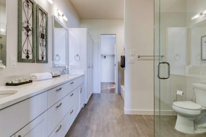 Bathtub, hair dryer, shampoo