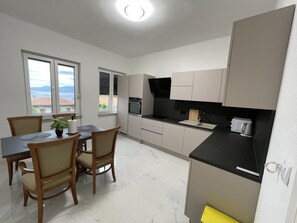 Apartment | Private kitchen | Fridge, microwave, oven, stovetop