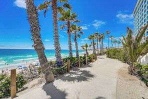 On the beach, sun loungers, beach towels
