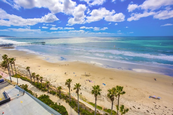 On the beach, sun-loungers, beach towels