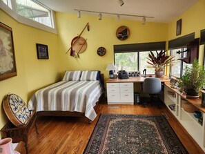 A bedroom with a bed, desk, and potted plants. - TREETOPS! A Reunion/Retreat/Event estate! JULY OPENINGS Seasonal POOL! Sleeps 12 (Guilford)