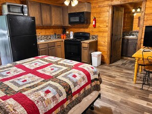 Unclassified image, 2 of 11, button - Charming 1-Bedroom Log Cabin – Ideal for Romantic Getaways! (Broken Bow)