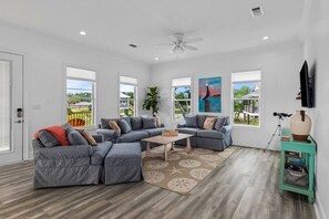 Smart TV, fireplace, books, offices