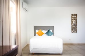 Premium bedding, down duvets, pillow-top beds, individually furnished