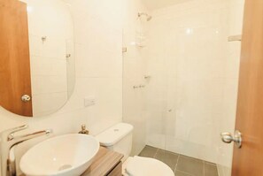 Shower, hair dryer, towels, soap