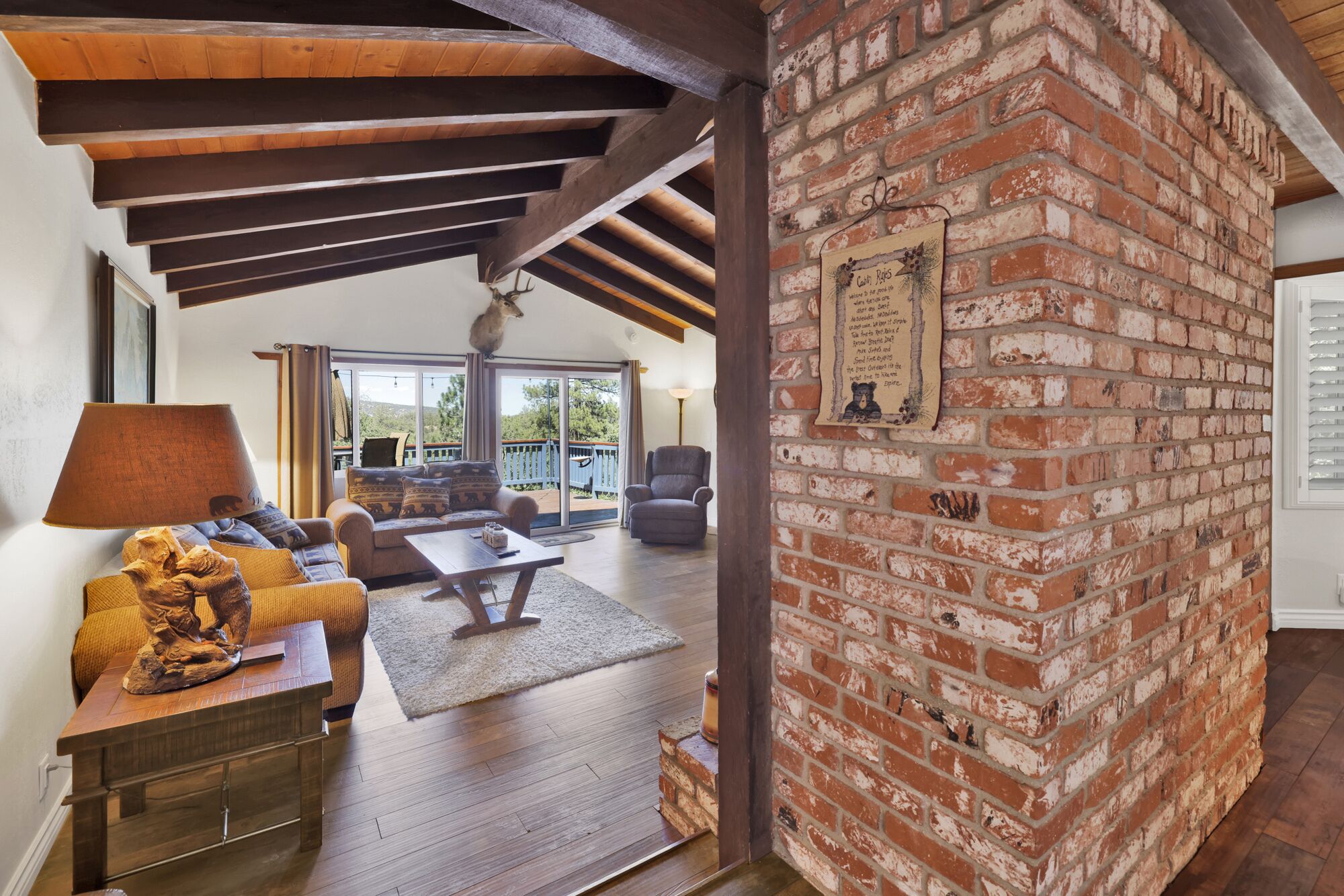 Elegant living room featuring cozy sofas, tasteful décor, and a serene ambiance for unwinding after a busy day.