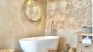 Bathtub, hair dryer, towels