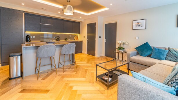 A modern apartment with a kitchen, a dining area, and a living room. - No. 35 (York)