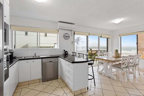 Fridge, microwave, oven, stovetop - Wake to Waves in Spacious 3-Bed Beachfront Unit (Mermaid Beach)