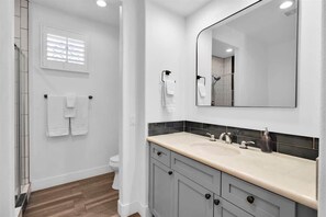 Bathtub, hair dryer, towels