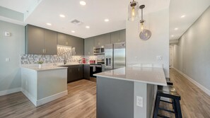 Fridge, microwave, oven, stovetop - The Strand 304 - Luxury Waterfront Bay Views - Heated Pool & Spa - Near Downtown (Sarasota)