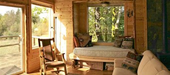 Pond Cottage. A roomy tiny home with a Pond