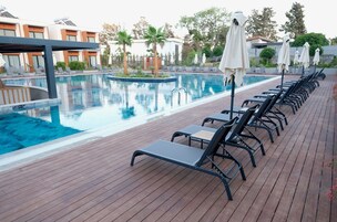 Standard Double Room | Pool | Seasonal outdoor pool, pool umbrellas, sun loungers