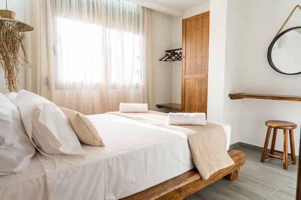 1 dormitorio, sistema de insonorización, tabla de planchar con plancha