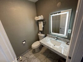 Shower, towels, soap, shampoo