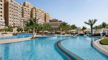 Outdoor pool, open 8:00 AM to 7:00 PM, pool umbrellas, pool loungers