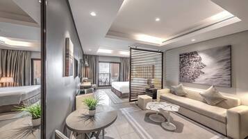 Deluxe Studio, 1 King Bed, Sea View | In-room safe, desk, laptop workspace, blackout curtains