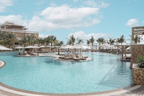 Outdoor pool, open 8:00 AM to 7:00 PM, pool umbrellas, pool loungers