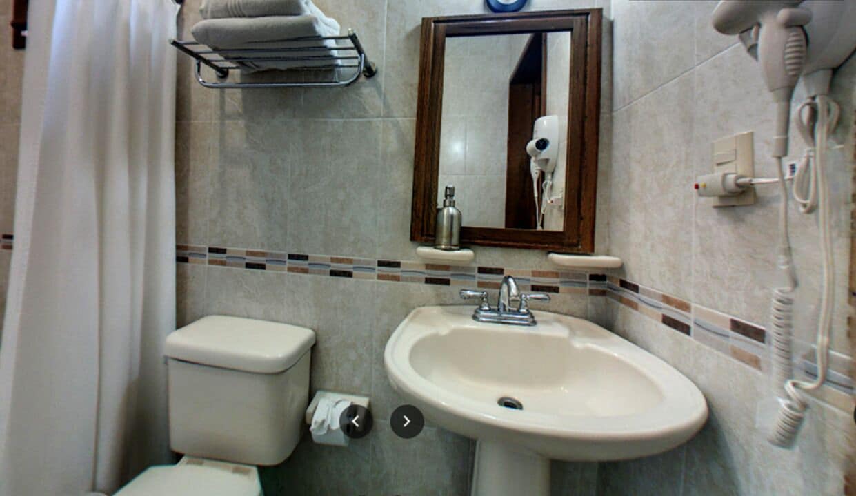 Shower, rainfall showerhead, hair dryer, towels