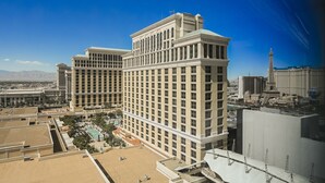 A large hotel with multiple floors and a prominent central tower.