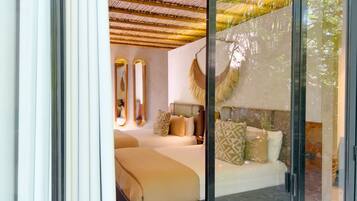 Habitación Deluxe | Ropa de cama de alta calidad y edredón