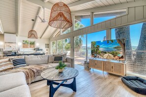 Smart TV, fireplace, table football, books