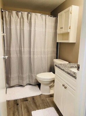 Shower, towels, soap, shampoo