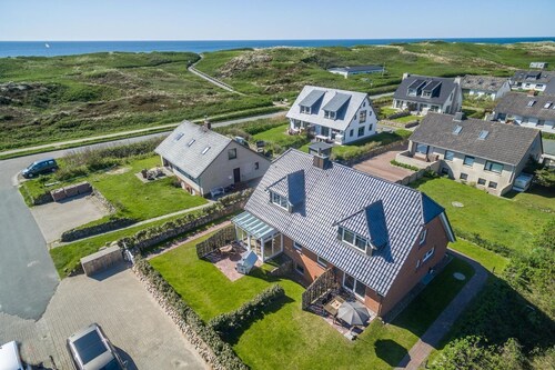 Am Sandwall-westseite - Strandnahe Doppelhaushälfte für 4 Personen: Terrasse, Garten, Stellplatz,