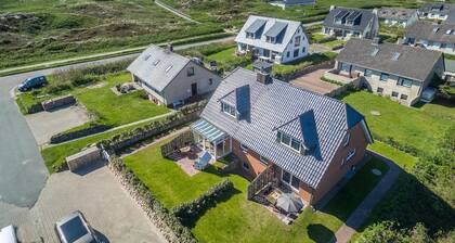 Am Sandwall-westseite - Strandnahe Doppelhaushälfte für 4 Personen: Terrasse, Garten, Stellplatz,