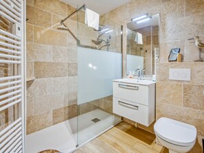 Shower, free toiletries, hair dryer, towels