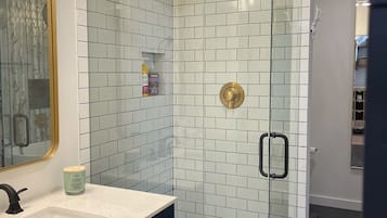 Bathtub, hair dryer, towels, soap