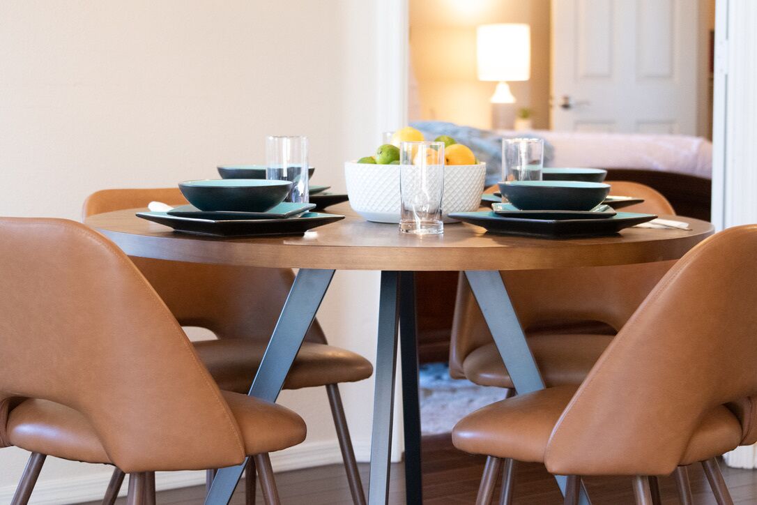 New in 2024, both the table and chairs were replaced to make the seating group more comfortable and warm.