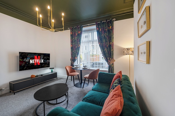 Designer accents and layered lighting add character and comfort, creating a relaxing atmosphere day or night.