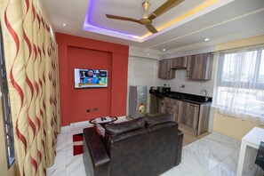 TV - 1 Bed Furnished Apartment - Wifi, Aircon, Security (Accra)