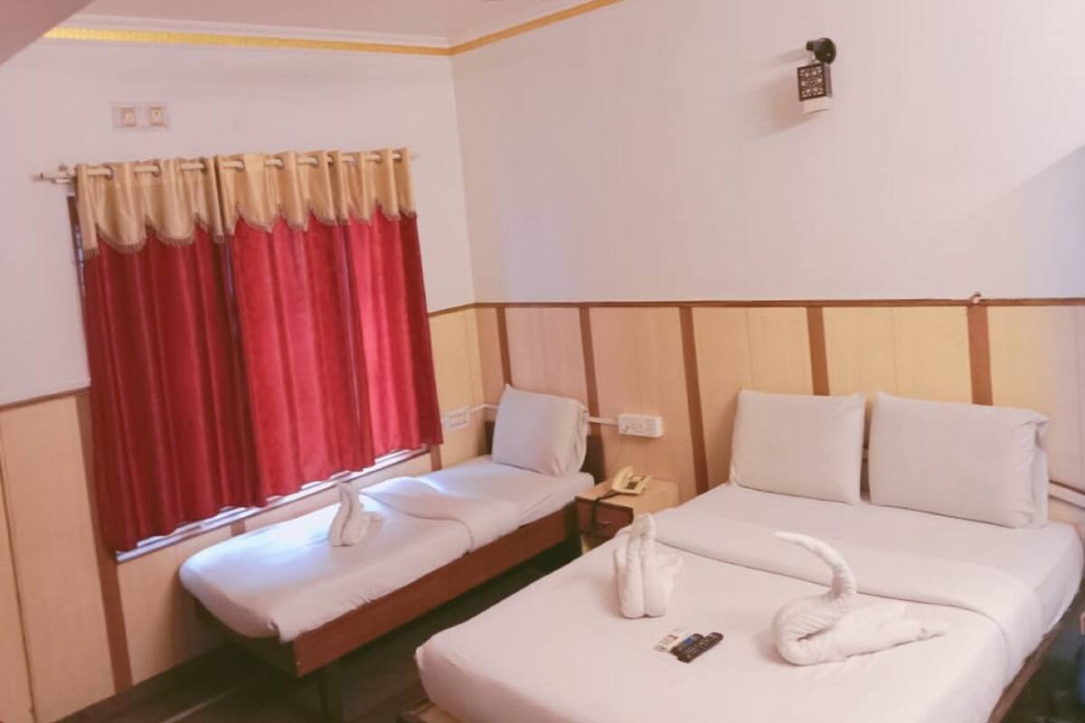 Chambre Premium | Draps en coton égyptien, literie de qualité supérieure, Wi-Fi gratuit