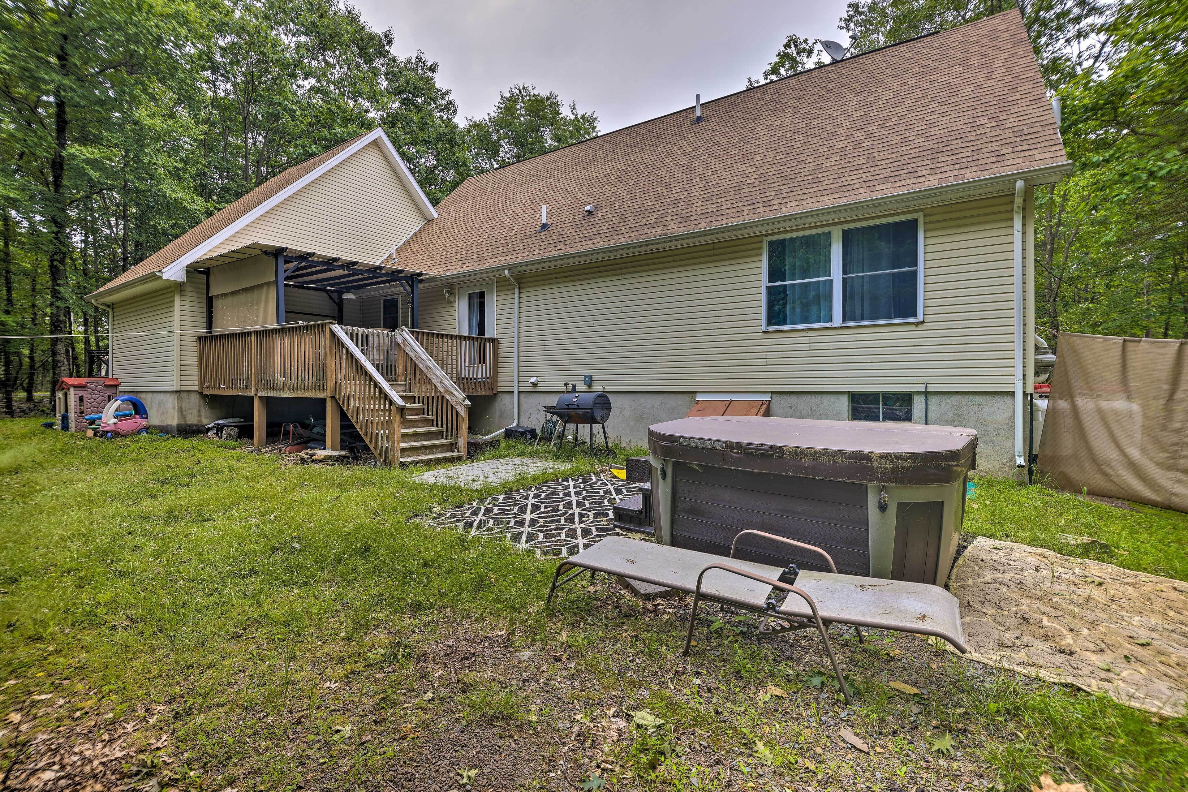 Poconos Family Retreat w/ Private Yard & Hot Tub!