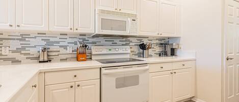 Fridge, microwave, dishwasher, coffee/tea maker