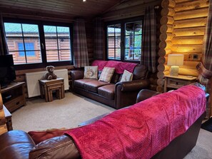 Smart TV, fireplace - Hadrians Lodge -  a log cabin that sleeps 6 guests  in 3 bedrooms (Morpeth)